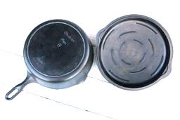 bottom of cast iron Iron Mountain (by Griswold) chicken pan and underside of cover. 