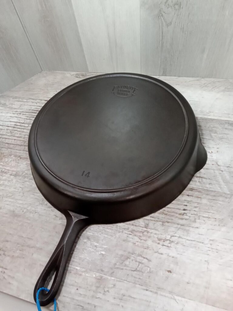 favorite piqua ware smile smiley logo heat ring cast iron skillet antique vintage pan fry fryer frying heat ring 14 price value how much money auction sold 