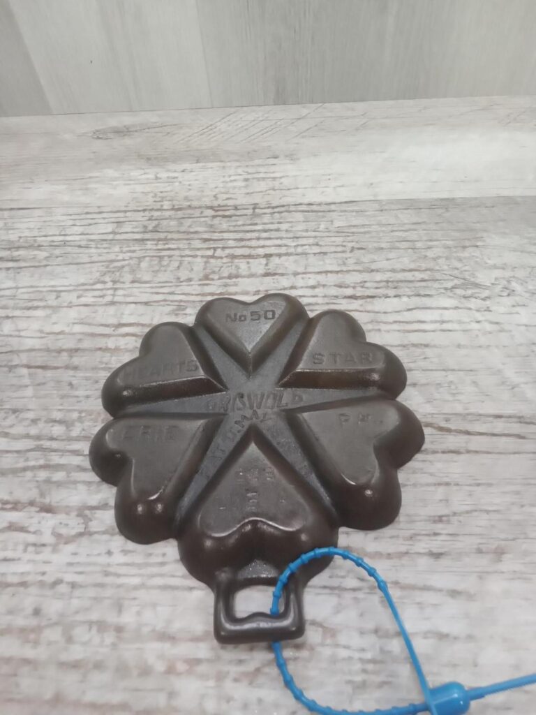 Sold at Auction: GRISWOLD CAST-IRON HEART STAR WAFFLE MAKER