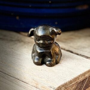 Authentic vintage cast iron pup made by the Griswold Mfg Co of Erie, Pennsylania, front.