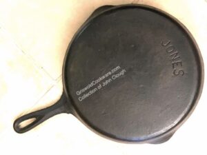 cast iron skillet marked Jones collection of John Clough