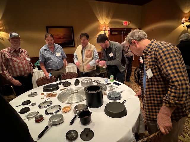 Rare antique Griswold cast iron pieces at show and tell Griswold cast iron cookware convention.