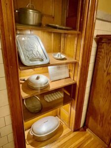 Display at the Watson Curtz Mansion of Griswold vintage and antique cast aluminum products. 