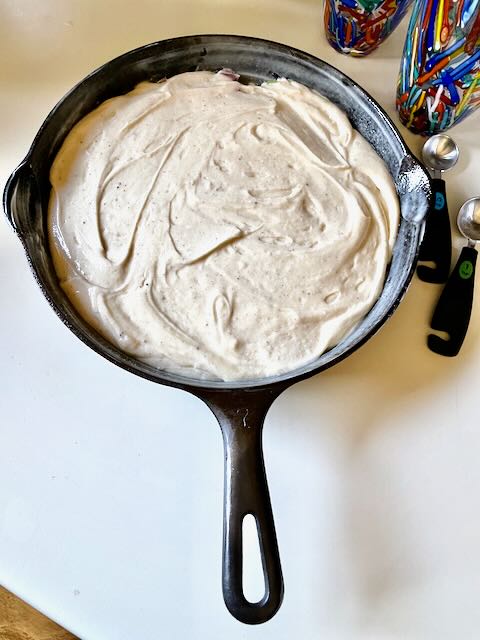 rhubarb cake batter in vintage griswold skillet