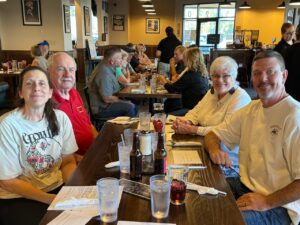 Group of people at Capote's restaurant. 