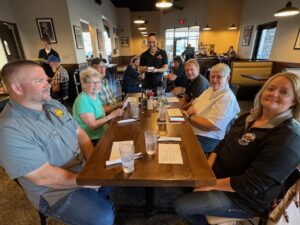 Group of people at Capote's restaurant. 