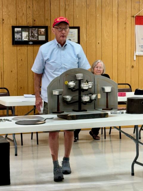 Tom Moran with Mohawk salesman display. 