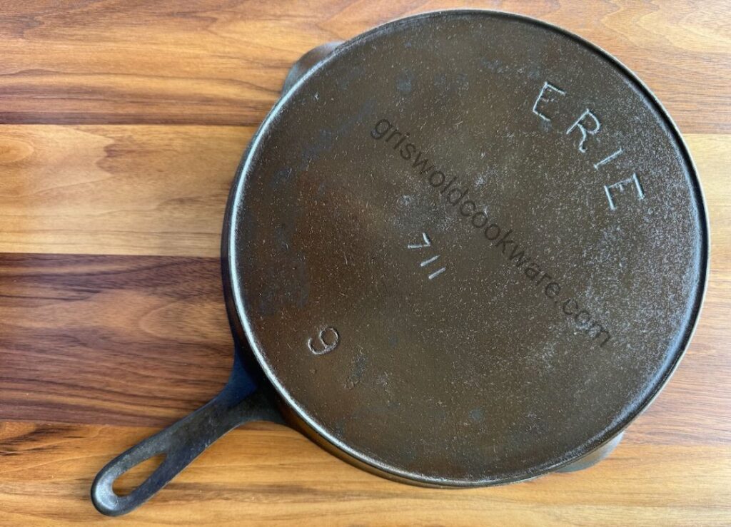 Griswold-made ERIE cast iron skillet number 9, product number 711, bottom view. 