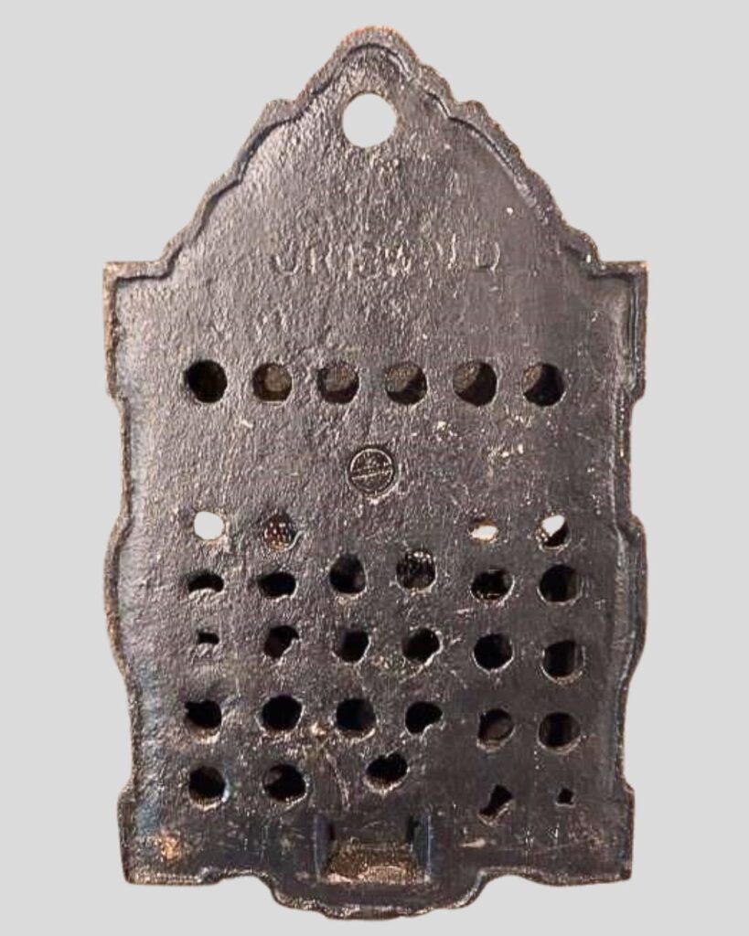 Vintage cast iron match keeper or holder. Has a flat head screw in back. Stamped/incised GRISWOLD.