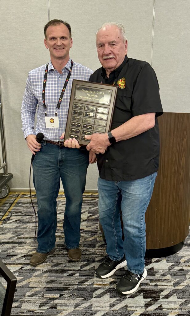Griswold & Cast Iron Cookware president Josh Delp and past president Art Chatfield at the cast iron convention. 